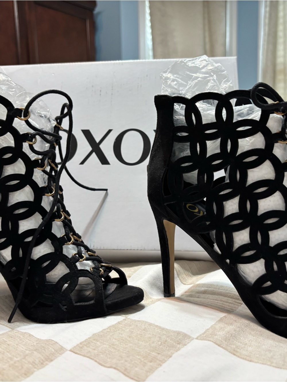 XOXO Black Laser-Cut Lace-Up Stiletto Heels